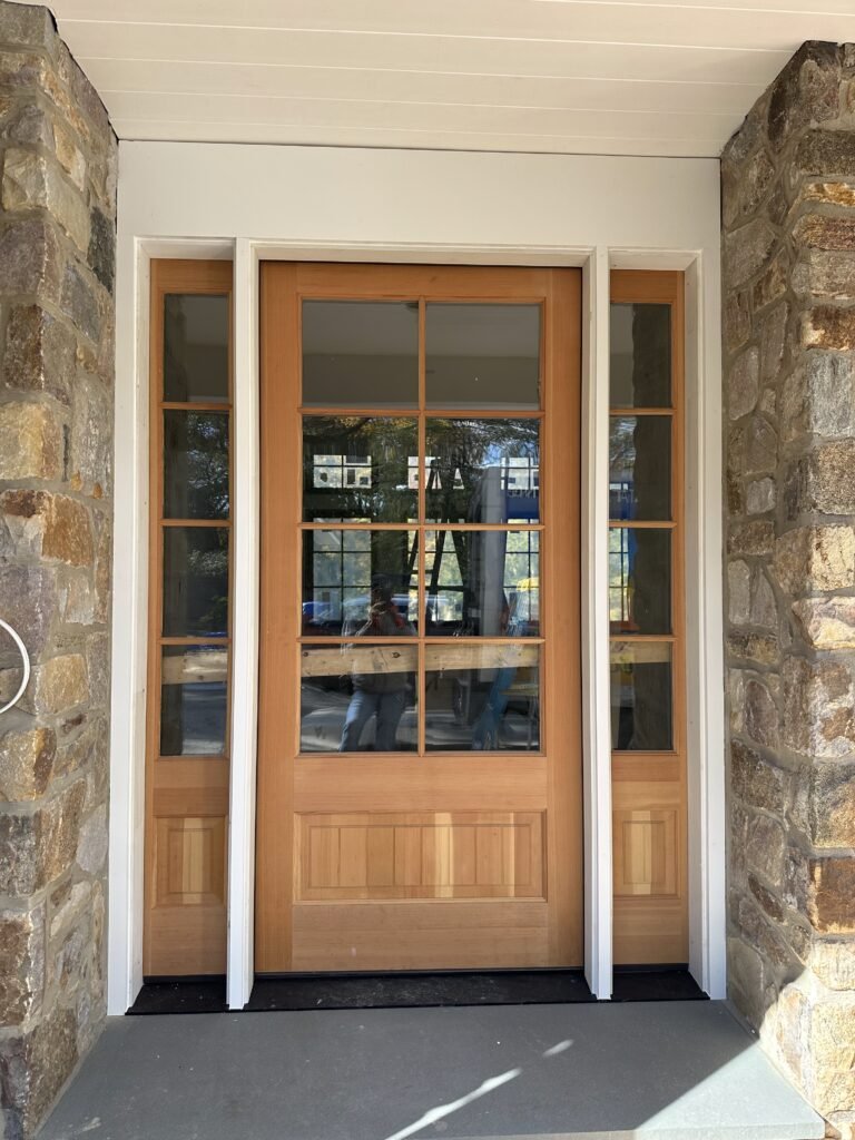Custom wood entry door with sidelights installed in West Chester PA stone home by D&E Mako RenovationCustom wood entry door with sidelights installed in West Chester PA stone home by D&E Mako Renovation