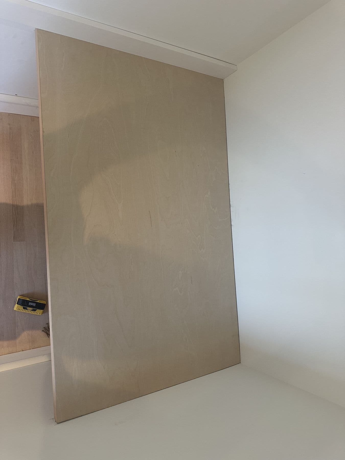 Large panel leaning against the wall before installation