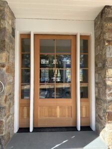 Custom wood entry door with sidelights installed in West Chester PA stone home by D&E Mako RenovationCustom wood entry door with sidelights installed in West Chester PA stone home by D&E Mako Renovation